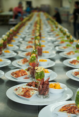 Preparing catering food for an event.
