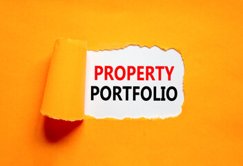 Property portfolio symbol. Concept words Property portfolio on beautiful white paper. Beautiful orange paper background. Business Property portfolio concept. Copy space.