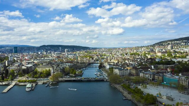 Zurich City Old Town Skyline and Limmat River on Sunny Day. Switzerland. Aerial Hyper Lapse, Time Lapse. Drone Moves Forward