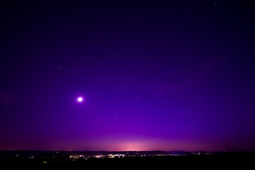 Nightsky with Stars, Moon, and Aurora, Northern Lights over Leiblfing Lower Bavaria Germany.