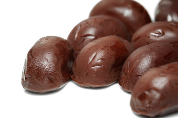 Chocolate candies. Bunch of melting chocolate candies on a white