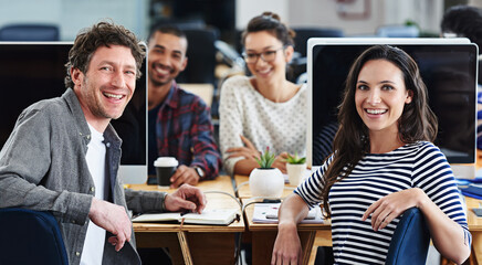 Business people, teamwork and portrait by desktop computer for collaboration or workflow in coworking space. Creative group, editor or writer planning and brainstorming project at publishing agency