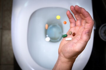 Throwing pills down the toilet. The idea of getting rid of dependence on the modern pharmaceutical...