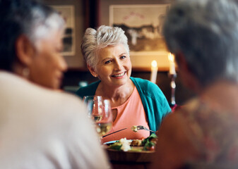 Senior women, friends and food in restaurant for reunion, chat and retirement together with wine. Elderly people, smile and eating in diner for memory, conversation and social celebration with drinks