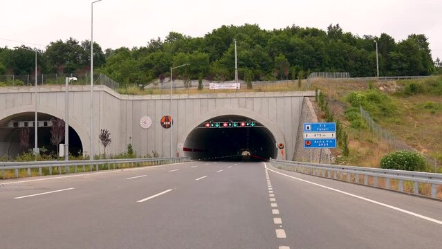 vehicle approaching the tunnel entrance