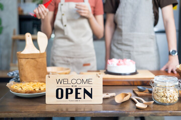 Store open sign. Open on cafe or restaurant on table