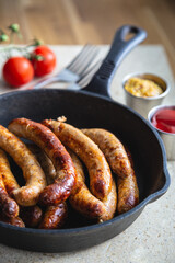 Fried sausages with sauces
