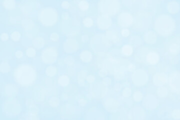 Abstract blue and white bokeh light snowfall background. New Year, Christmas, Winter and all celebration background concept.