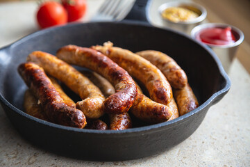Fried sausages with sauces