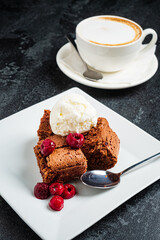 brownie with ice cream and cherries