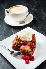 brownie with ice cream and cherries