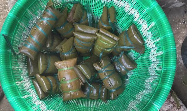 Buras or Burasa, Bugis Makassar traditional food made from coconut milk rice wrapped in banana leaf and boiled. Usually served on Eid day in Indonesia.