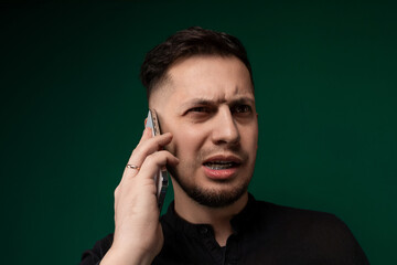 Man Holding Cell Phone to Ear