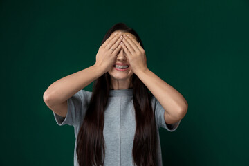 Woman Covering Eyes With Hands