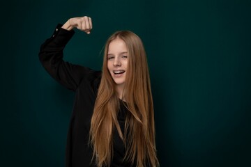 Woman With Long Red Hair Posing for a Picture