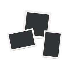 重なって置かれたポラロイド写真