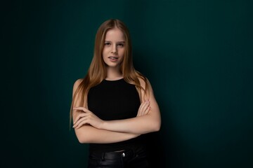 Woman With Long Red Hair Standing With Arms Crossed