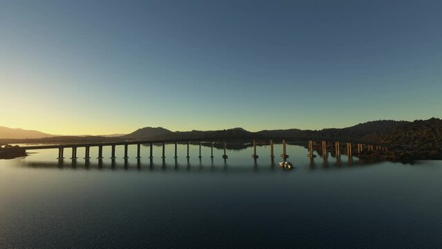 Sunset aerial drone view Tasman Bridge in Montagu Bay - Tasmania island. Australia