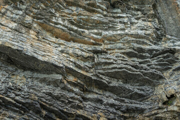 Amazing hillside cliff with compressed layer rock structure or call Pancake rock in the nature geological. 