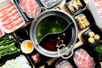 Japanese sukiyaki soup and seaweed soup with fresh pork, beef, egg, and organic vegetable with delicious yummy shabu sauce for suki yaki soup japanese style for family dinner meal in buffet restaurant