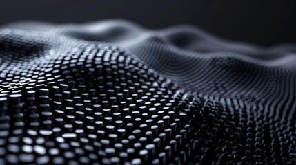 Abstract black dots forming a wavy surface, creating a futuristic and high-tech visual effect