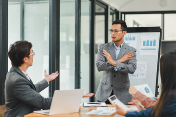 Business Team Facing Disagreement in Meeting.