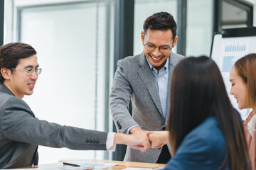 Business Team Celebrating Success with Fist Bump.