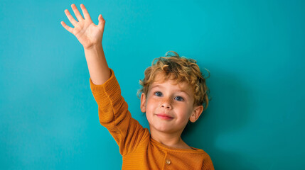 a Caucasian student raising their hand to answer a question