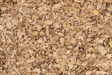 Wooden chips texture background. small wood chips for smoking. sawdust texture. ecological fue