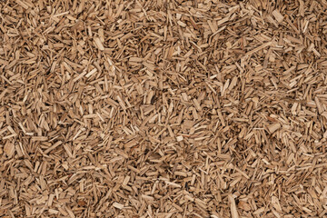 Wooden chips texture background. small wood chips for smoking. sawdust texture. ecological fue