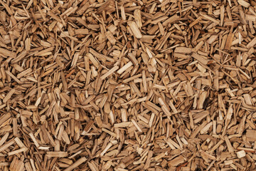 Wooden chips texture background. small wood chips for smoking. sawdust texture. ecological fue