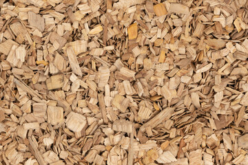 Wooden chips texture background. small wood chips for smoking. sawdust texture. ecological fue