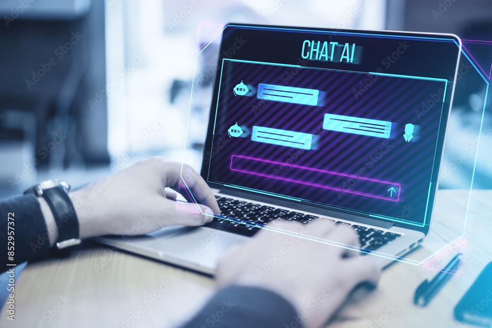 Poster close up of man hands using laptop on wooden desk with and creative ai chat hologram on blurry backg