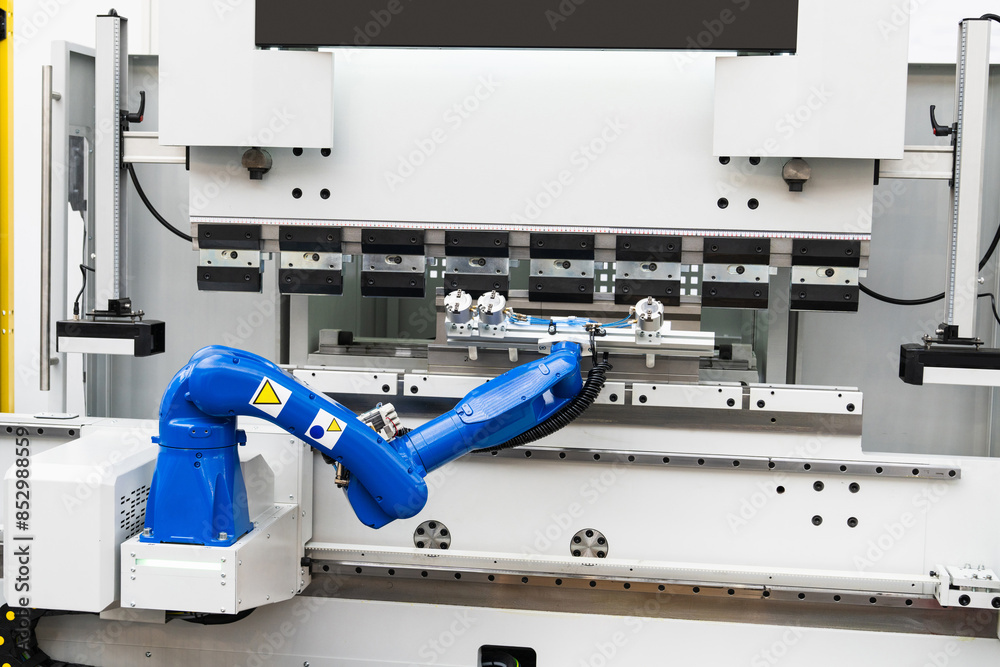 Aufkleber A robotic arm. Automatic robot in a smart factory