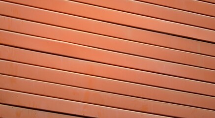 A wall with a row of wooden boards