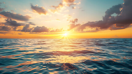 Obraz premium Sunrise amidst the ocean, wallpaper, the first light of the day passes through the beautiful waters.