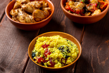 Couscous with chicken and stewed vegetables with meat on the festive table