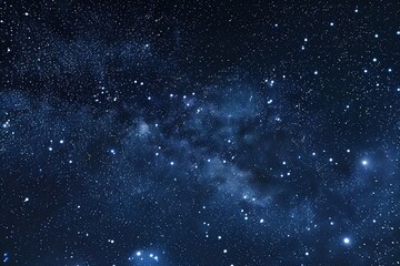 Starry night sky with dense clusters of stars and the Milky Way galaxy