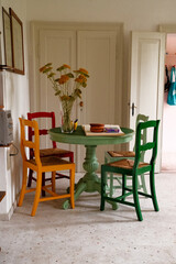 Colourful wooden furniture in a historic country-style house