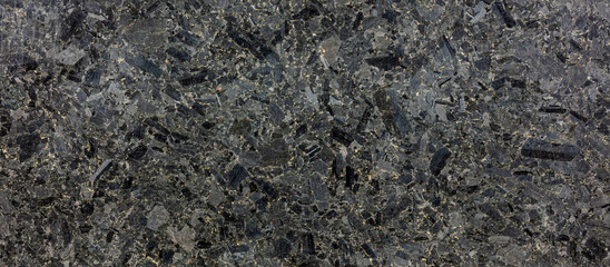 texture of dark gray natural granite stone. natural pattern. panoramic image.