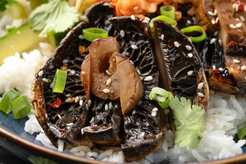 Korean mushrooms bowl with cucumber salad, kimchi and rice