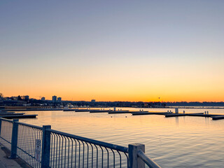 Sunset on the waterfront, illuminating the sea