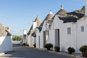 Beautiful view of a narrow street in the city of Alberobello.