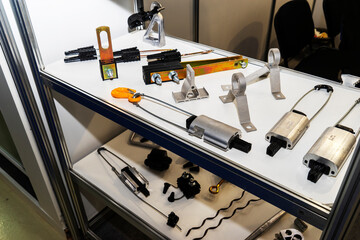 Various iron, glass, ceramic insulators for high-voltage power lines in the shop window