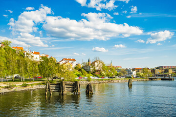 Sunny Day in Gothenburg, Sweden: Waterfront Homes and Tranquil Waters