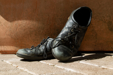 Vintage Worn Leather Shoes in Rustic Setting