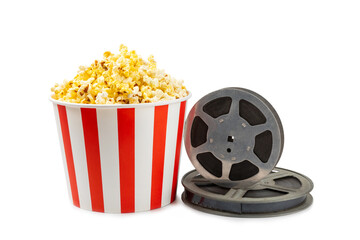 Tasty popcorn in buckets and cold cola drinks with cinema tickets, movie clapper and 3D eyeglasses...