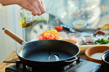 Step-by-step cooking process. Pour vegetable oil, olive oil or sunflower oil into a preheated frying pan.