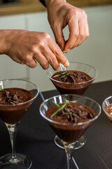 Close up of a Woman Chef Crafting Chocolate Mousse