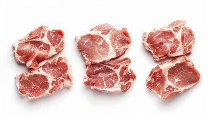 Fototapeta premium Fresh boneless slices of raw pork neck from three different cuts set against a white background